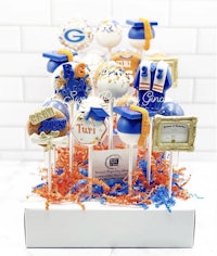 graduation cake pops in a box